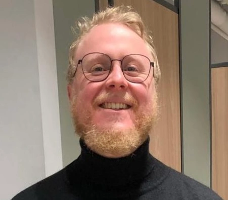 Chris, owner of Professional Translations and DRC client